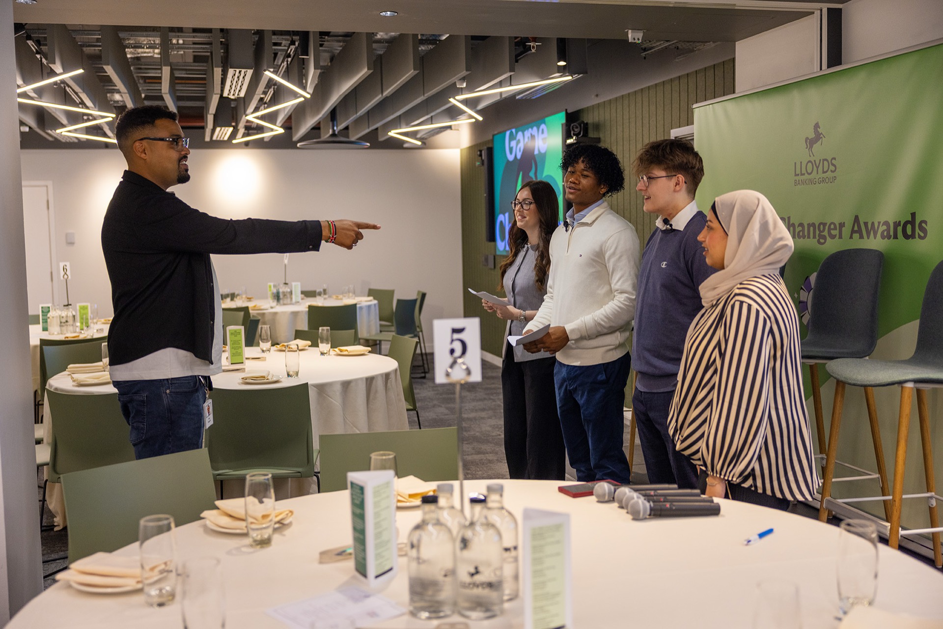 Tom coaching a group of young Game Changers at a Lloyds awards event